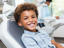 Happy Child in Dentist Chair - Midlothian Family Dentistry